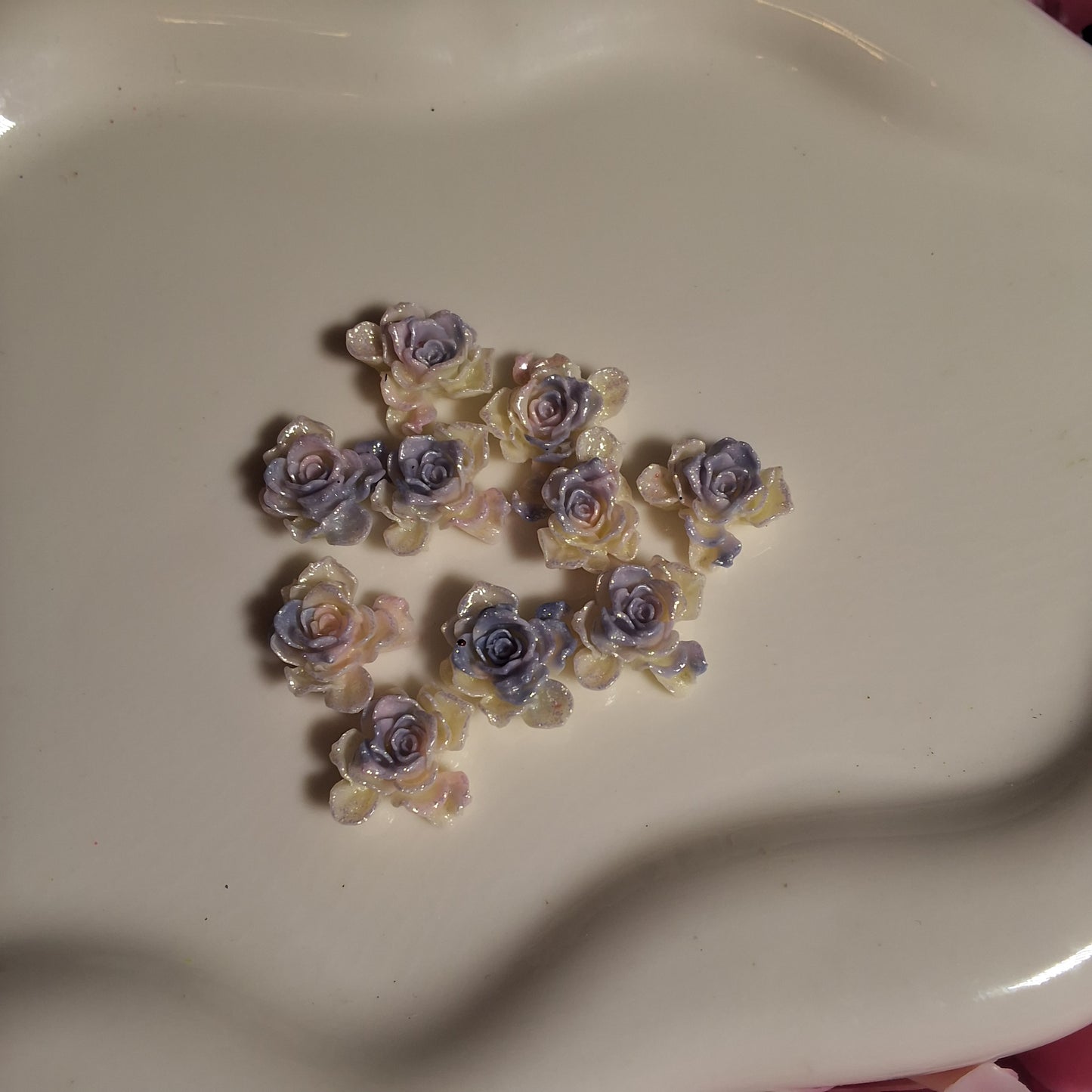 Glow in the dark white and purple rose